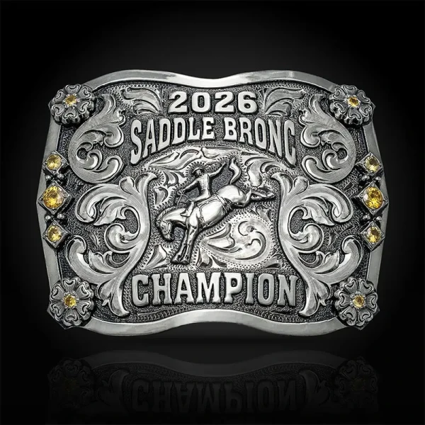 Our Union Belt Buckle features a stippled German Silver base with engraved scrollwork, bold lettering, a custom center figure, and an optional CZ stone accent.
